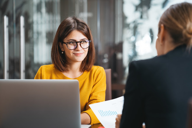 Employee discussing opportunities with a staffing company