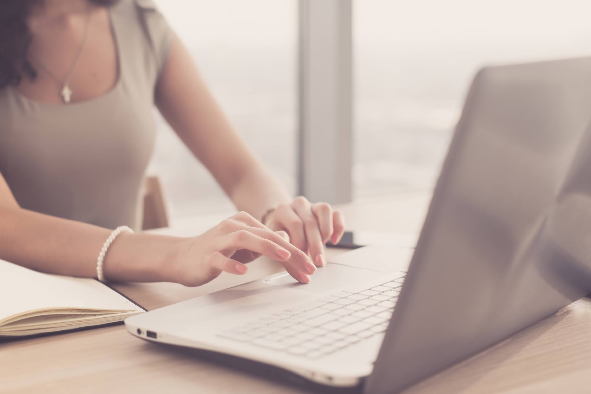 Job seeker researching a company online before an interview